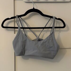 TNA blue-grey sports bra